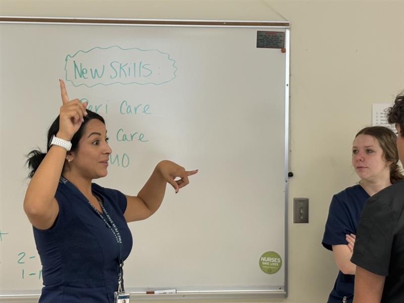 students and teacher in a lecture