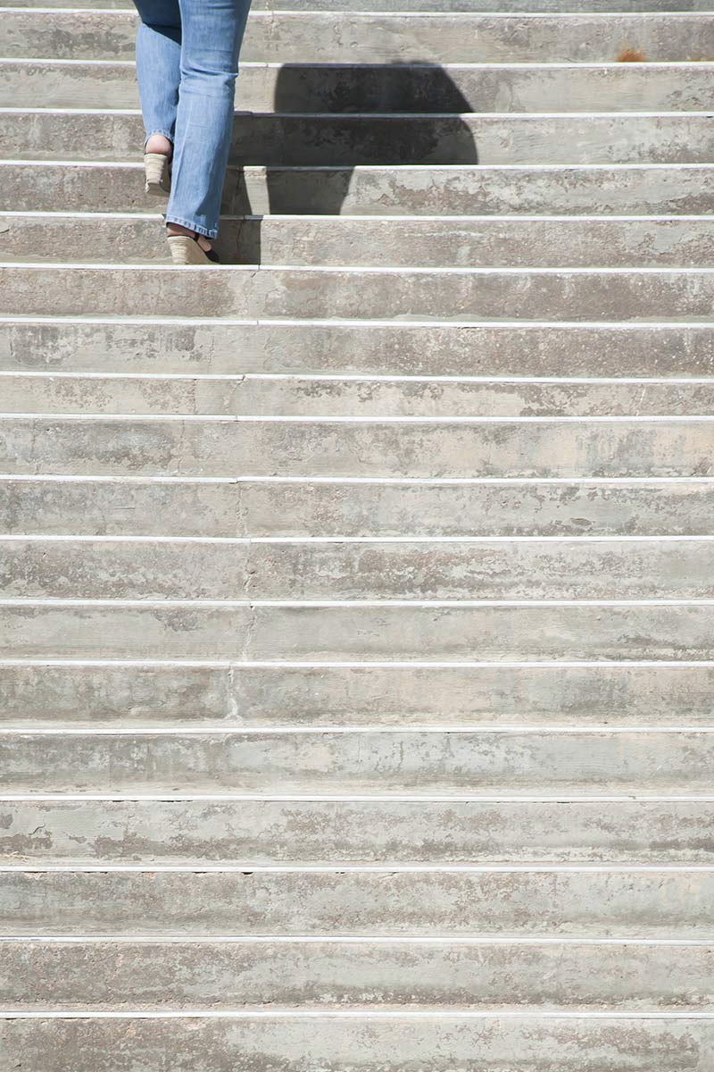 student walking up stairs