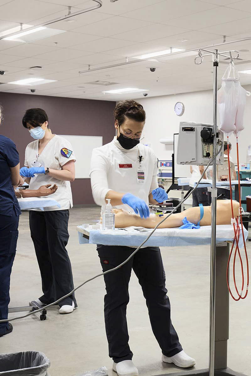 student learning to draw blood
